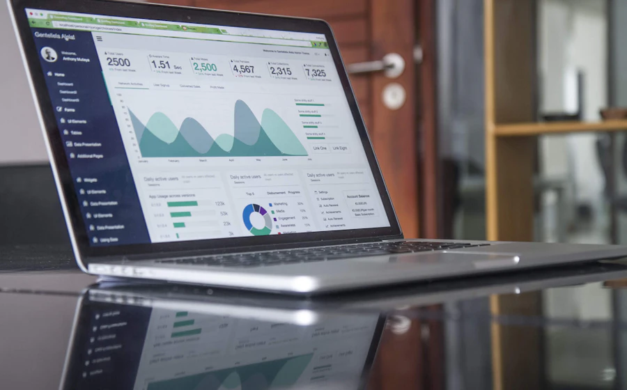 Laptop showing a website analytics dashboard with traffic charts